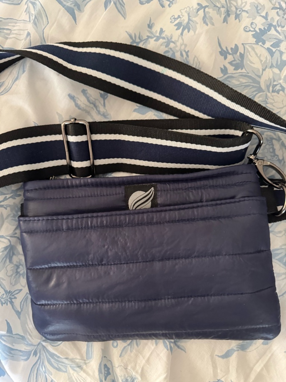 THINK ROYLN Navy Quilted Crossbody with Black & White Striped Strap